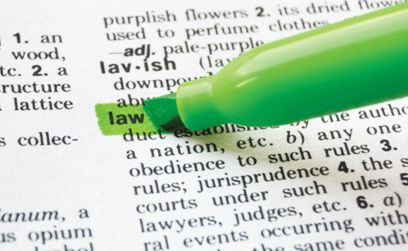 The word law highlighted in a dictionary