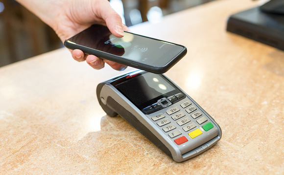 Making payments using NFC readers in smartphones
