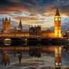 The Palace of Westminster and the Big Ben clock tower by the Thames river in London