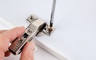 Hinges and other fittings for furniture and wardrobe accessories