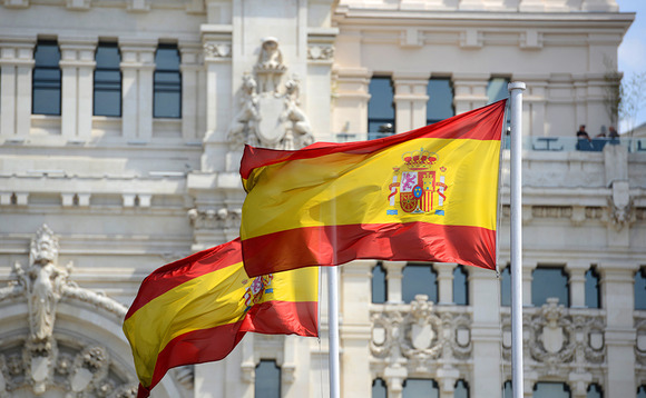 Spanish flag in front of the Palace of Communication in Madrid