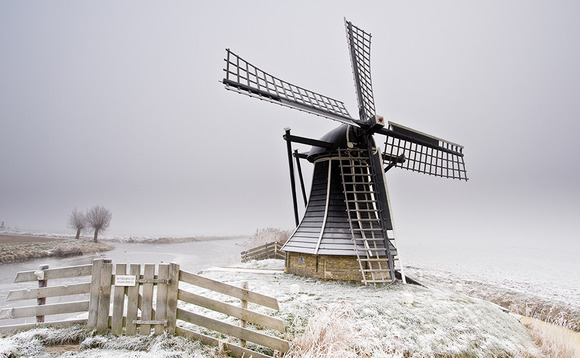 Frozen windmill in the Netherlands Frozen windmill in the Netherlands