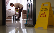Staff cleaning a hotel room