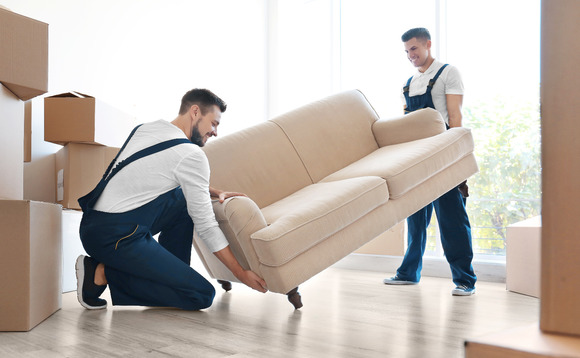 Men moving furniture