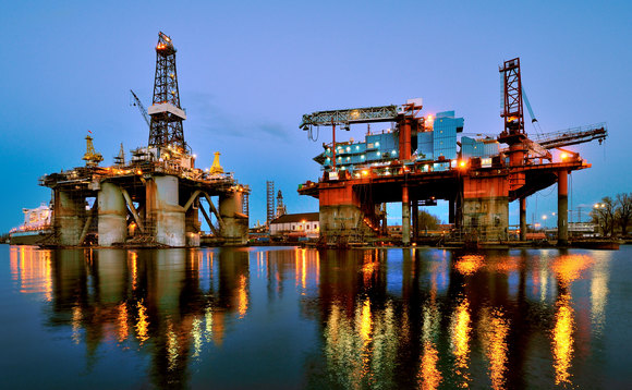 Oil rig undergoing repair work in port