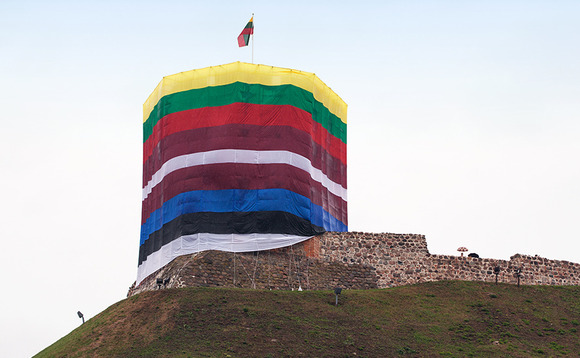 Gediminas tower wrapped in the flags of Baltic states