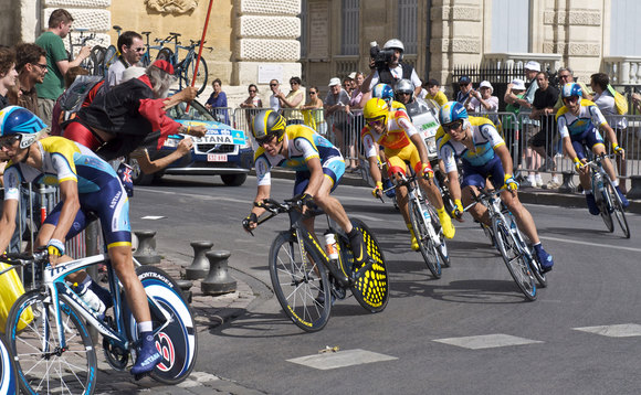 Cyclists competing in the Tour de France turn a corner Cyclists competing in the Tour de France turn a corner